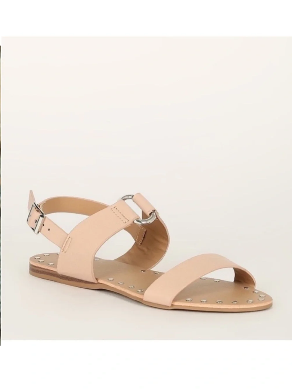 Nude leather studded metal ring accent slingback flat sandals